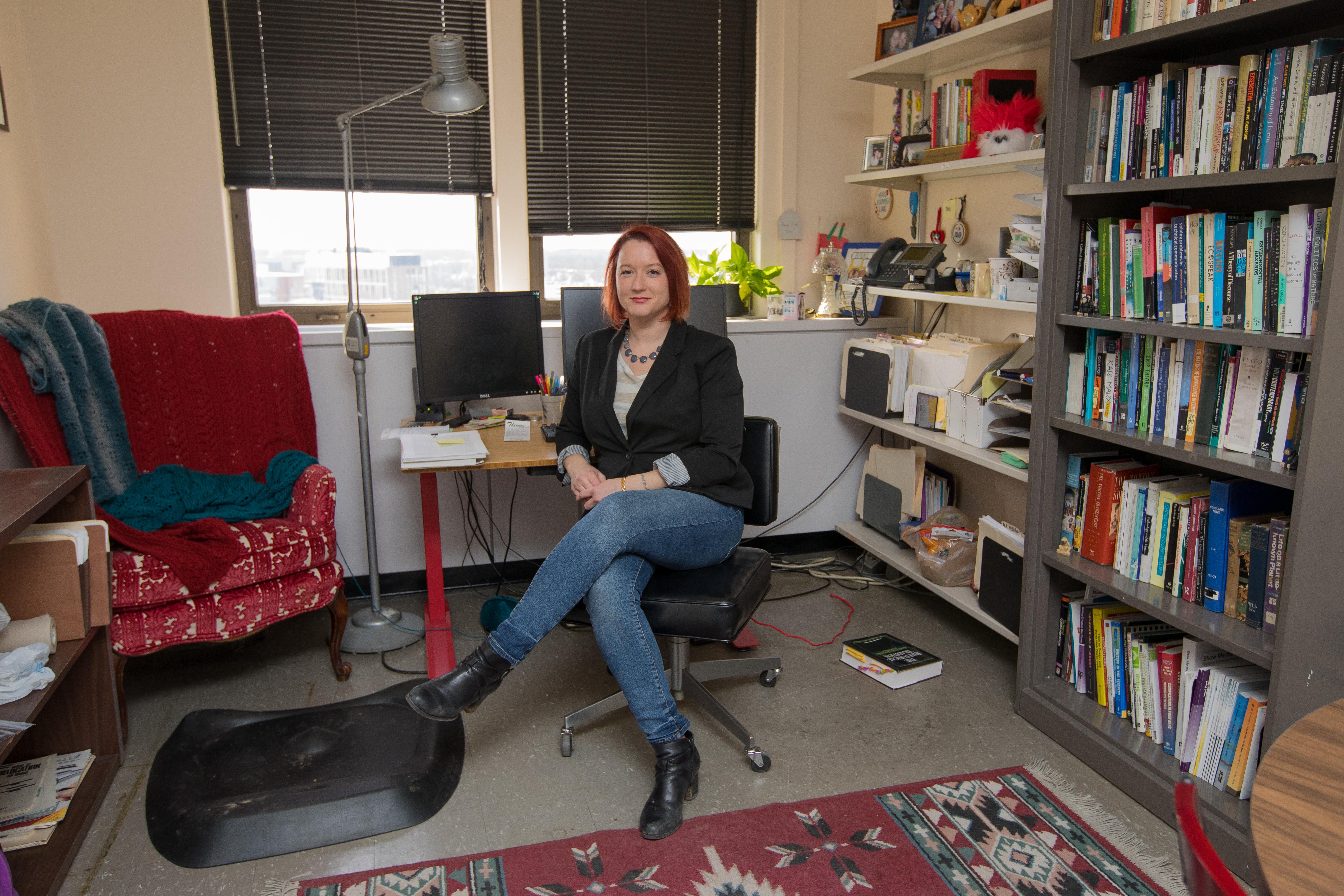 A photo of Dr. Lauren Cagle in an office. 